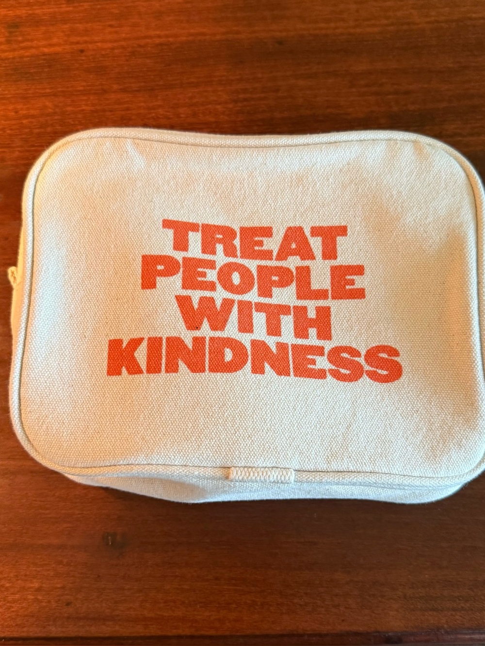 Cream Canvas Cosmetic Pouch with Bold Orange Slogan